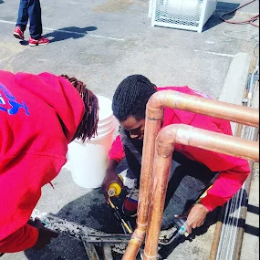 RR Plumbing N Minutes team on the job in Perris, CA